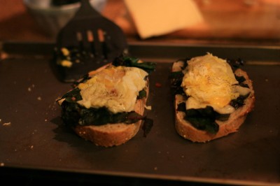 Greens bruschetta with fried eggs